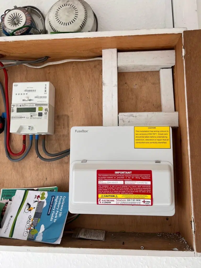 NICEIC electrician installing new consumer unit during fuse board upgrade in Enfield