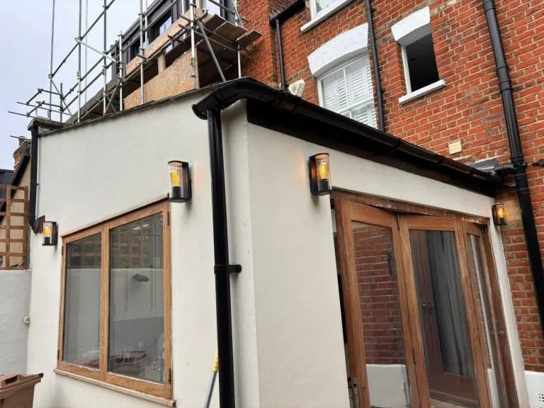 Wall-mounted outdoor up/down lights on Hampstead home