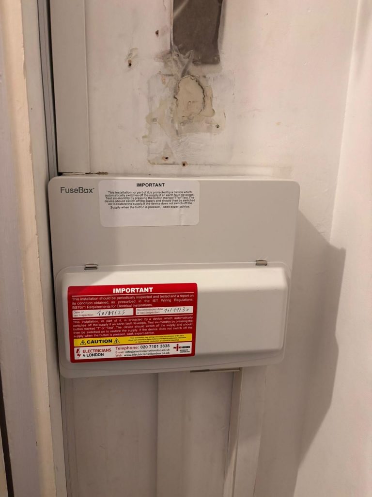 Electrician carrying out full house rewire in Islington