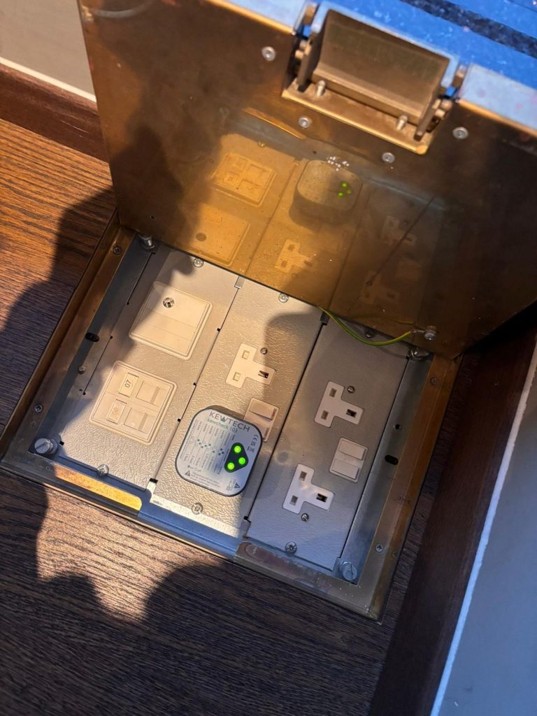 Electrician restoring power during out of hours call out