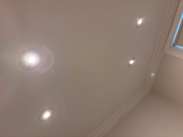 Electricians4London team installing new LED spotlights in London home