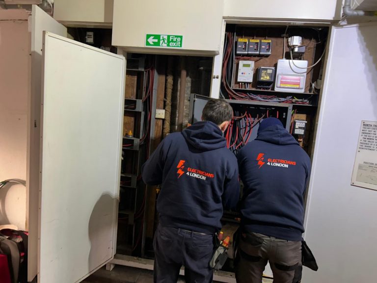 Electrician upgrading meter tails and incoming electrical supply in London
