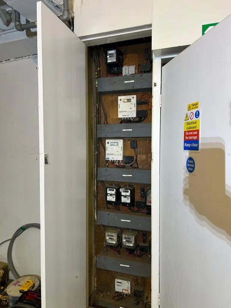 Electrical meter upgrade in London replacing old cloth insulated cables