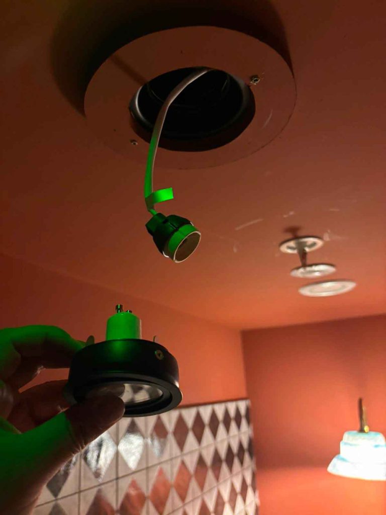 Commercial electrician carrying out maintenance at Mayfair restaurant